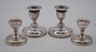 Lot 210 - A pair of Elizabeth II silver dwarf table...