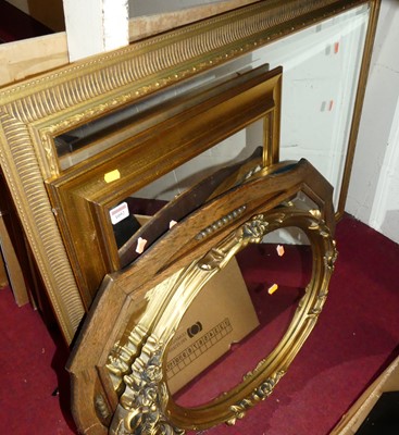 Lot 1092 - A gilt framed and beveled rectangular wall...