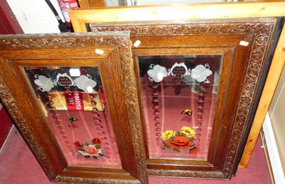 Lot 1099 - A pair of bevelled engraved and painted wall...