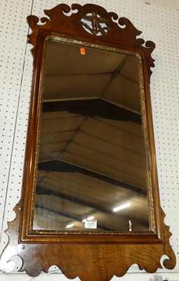 Lot 1125 - A Chippendale Revival faded mahogany fret...