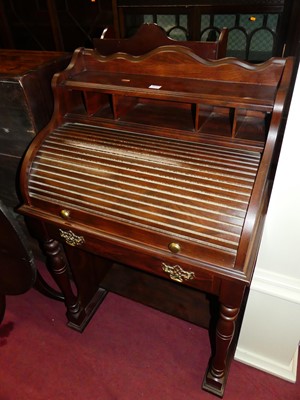 Lot 1371 - A reproduction cherrywood finish rolltop...