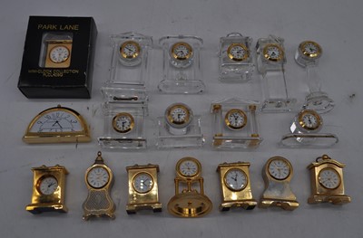 Lot 294 - A collection of brass cased miniature...