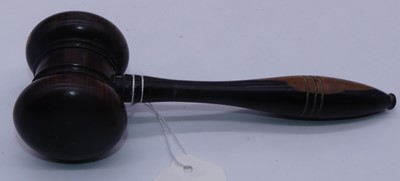 Lot 304 - A turned lignum vitae gavel, 18cm