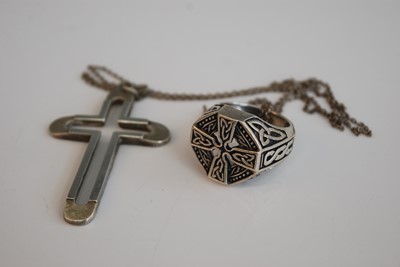 Lot 323 - A modern silver cross pendant on fine link...