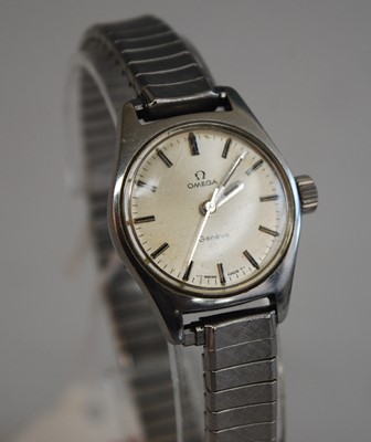 Lot 328 - A lady's Omega Geneve steel cased manual wind...