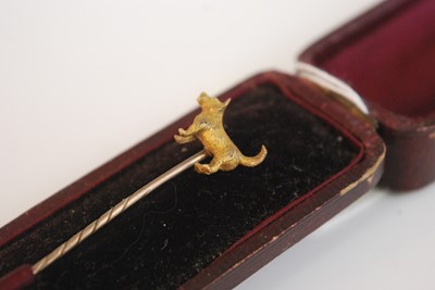Lot 336 - An Edwardian yellow metal tie pin fashioned as...