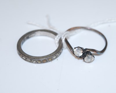 Lot 353 - A white metal paste set crossover ring...