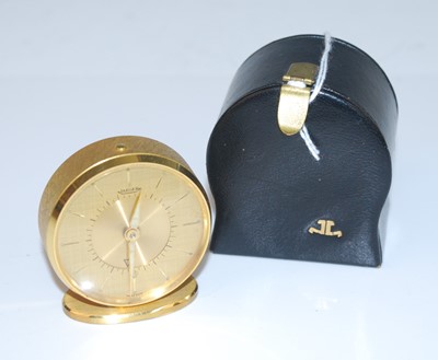 Lot 357 - A Jaeger gilt brass cased travelling alarm...