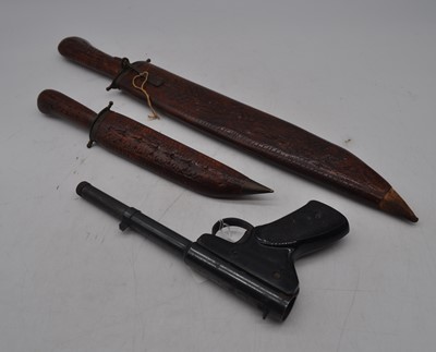 Lot 458 - A Milbro Model 2 air pistol, together with two...