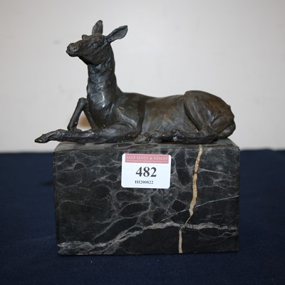 Lot 482 - A reproduction bronzed metal figure of a...