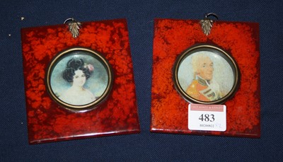 Lot 483 - A pair of reproduction portrait miniatures,...