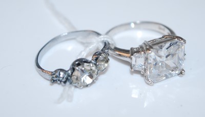 Lot 382 - A modern white metal and paste set dress ring,...