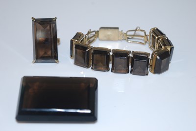 Lot 389 - A modern silver gilt and smoky quartz set...