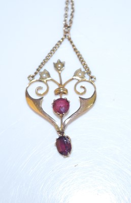 Lot 391 - An Edwardian 9ct gold, seed pearl and garnet...