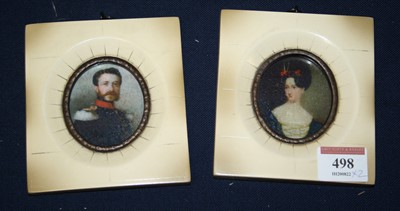 Lot 498 - A pair of reproduction portrait miniatures...
