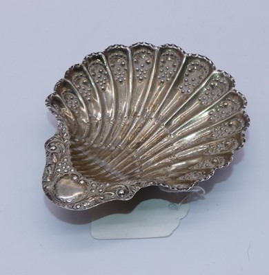 Lot 242 - An Edwardian silver butter dish, of shell...