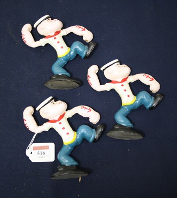 Lot 516 - A set of three reproduction painted cast iron...
