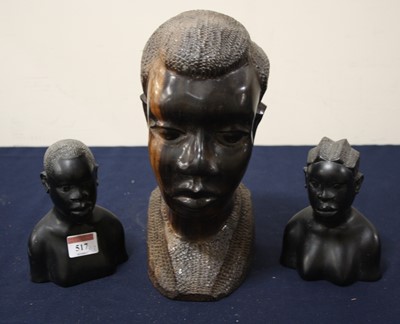 Lot 517 - A large North African carved hardwood male...