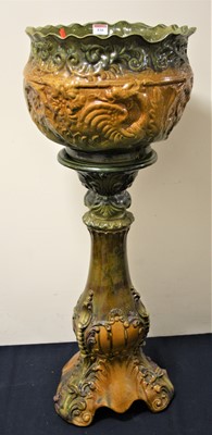 Lot 530 - A late Victorian art pottery green and brown...