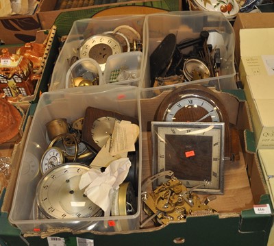 Lot 416 - Two boxes of clock parts, to include movements,...