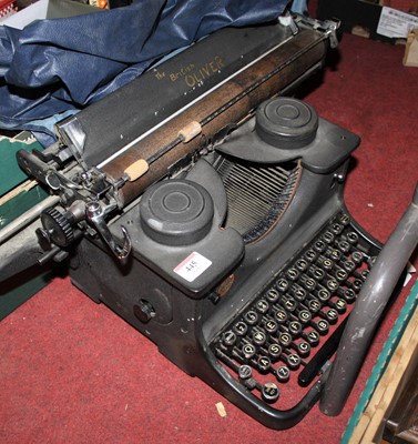 Lot 445 - A vintage The Oliver typewriter; together with...