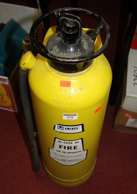 Lot 579 - A vintage Kwench yellow painted fire extinguisher