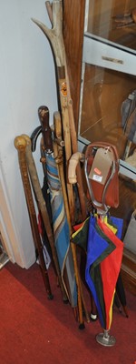 Lot 573 - A collection of vintage walking sticks and...