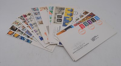 Lot 572 - A box of first day covers, many within albums