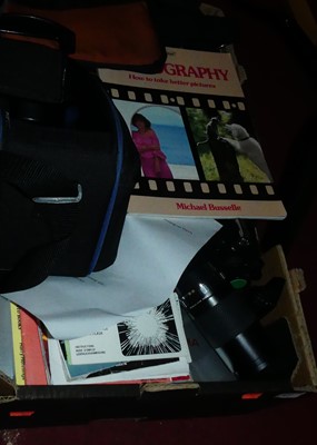 Lot 432 - A box of photography equipment to include...