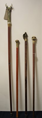 Lot 531 - A reproduction two-piece walking stick, the...