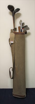 Lot 532 - A collection of golf clubs, to include a...