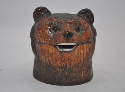 Lot 249 - A Black forest style inkwell, carved in the...