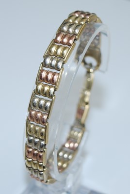 Lot 2536 - A 9ct yellow, rose and white gold bead link...