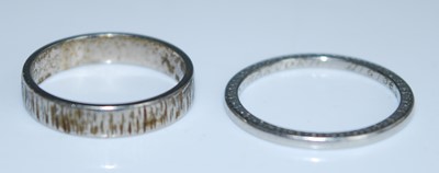Lot 2546 - Two wedding bands, being an 18ct white gold...