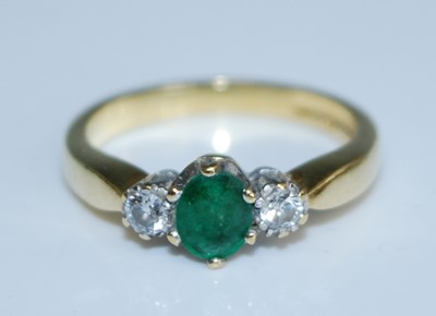 Lot 2551 - An 18ct yellow and white gold, emerald and...