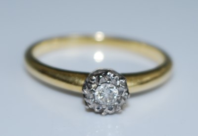 Lot 2552 - An 18ct yellow and white gold diamond single...