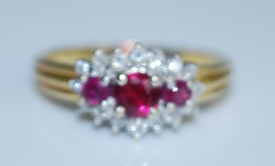 Lot 2568 - An 18ct yellow and white gold, ruby and...