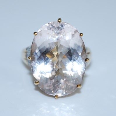 Lot 2590 - A 9ct yellow gold pink topaz and diamond dress...