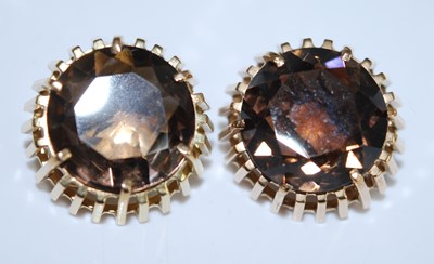 Lot 2591 - A pair of yellow metal smokey quartz earrings...