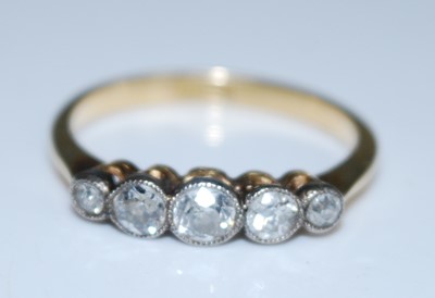 Lot 2601 - A yellow and white metal diamond five stone...