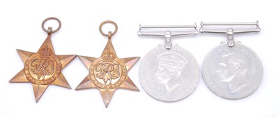 Lot 116 - A group of four WW II medals, to include...