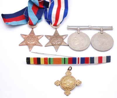 Lot 205 - A group of five medals to include 1939-1945...