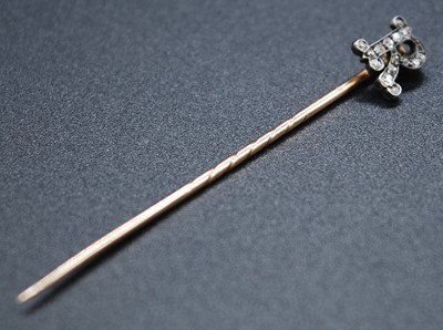 Lot 2610 - A yellow metal initial R stick-pin set with...