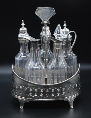 Lot 56 - A George III white metal five bottle cruet...