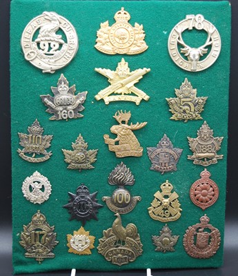 Lot 72 - A collection of cap badges and insignia,...