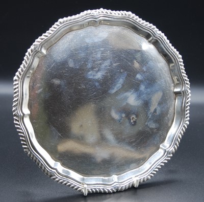 Lot 2167 - A George V silver card waiter, of shaped...