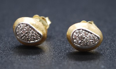 Lot 2623 - A pair of 18ct yellow gold diamond earrings by...
