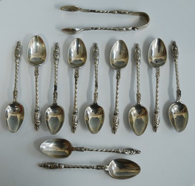 Lot 2164 - A set of eleven George V silver apostle spoons...