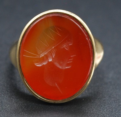 Lot 2678 - A Victorian yellow metal carnelian set signet...