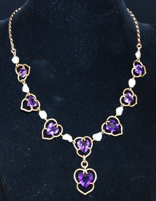 Lot 2686 - A vintage yellow metal, amethyst and pearl set...